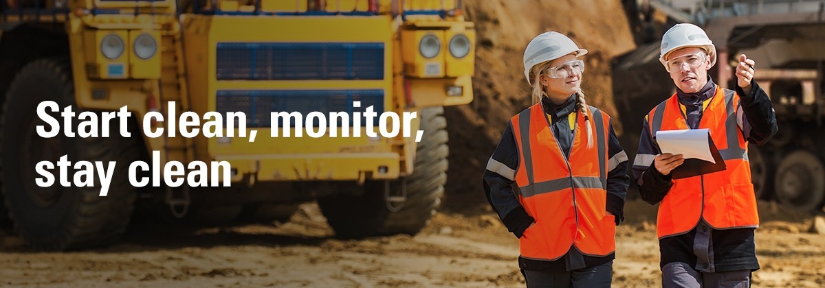 2 people inspecting site